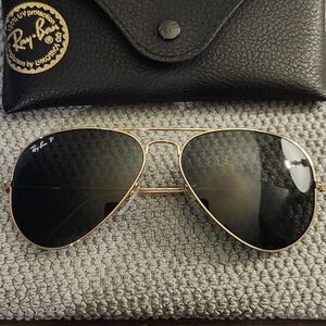 Ray-Ban Aviator Sunglasses with Gold Frame and Dark Lenses
